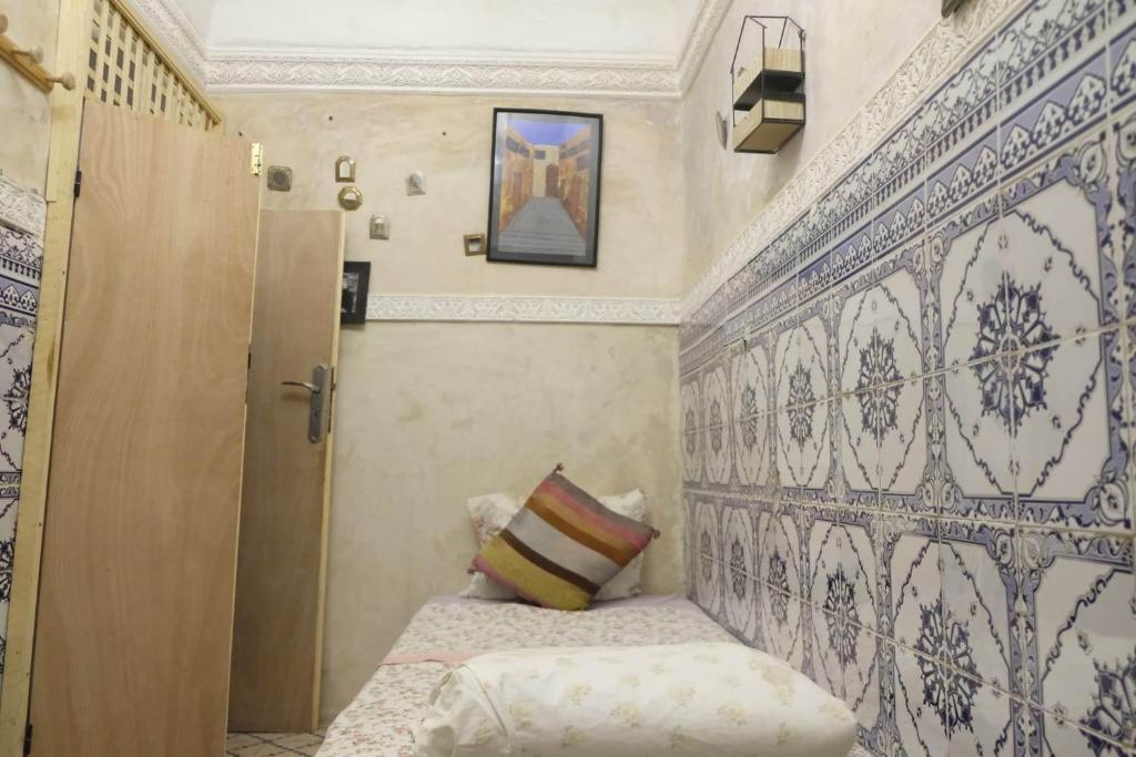 Postel nebo postele na pokoji v ubytování hannah house