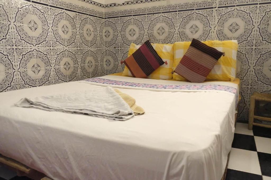 Postel nebo postele na pokoji v ubytování hannah house