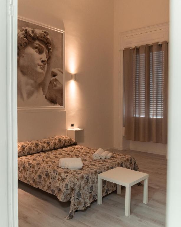 Postel nebo postele na pokoji v ubytování B&B Art