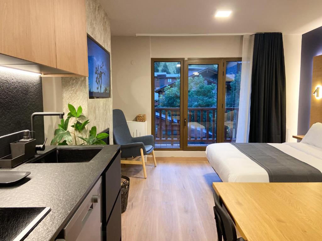 Voodi või voodid majutusasutuse Modern Blue Studio En Valle De Incles - Parking Gratis l by BonesVacances toas