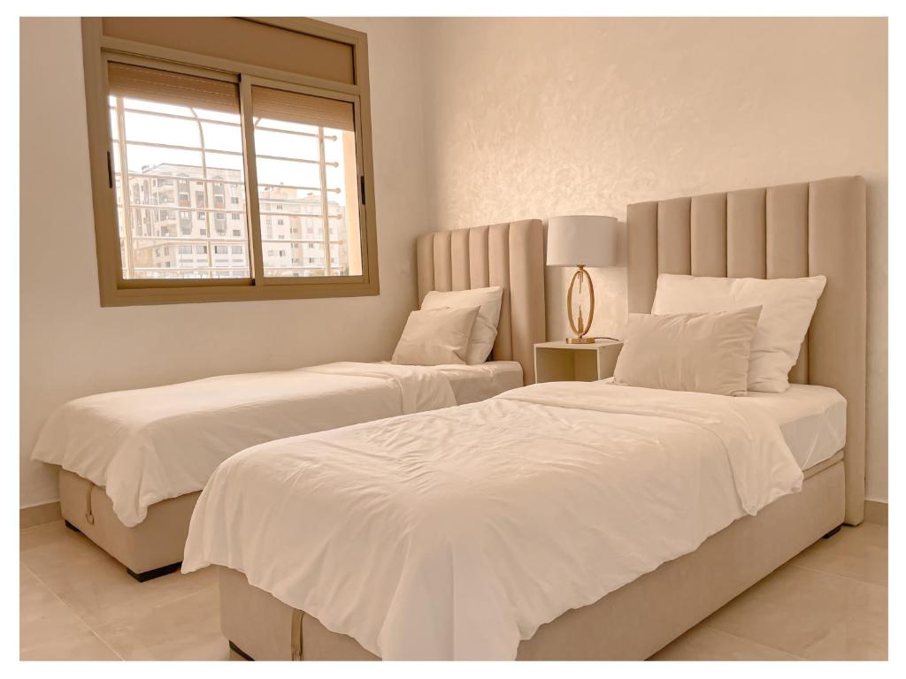 Lova arba lovos apgyvendinimo įstaigoje Appartement de luxe Al hoceima