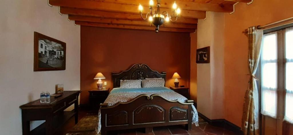 Postel nebo postele na pokoji v ubytování Villa Claus Inn