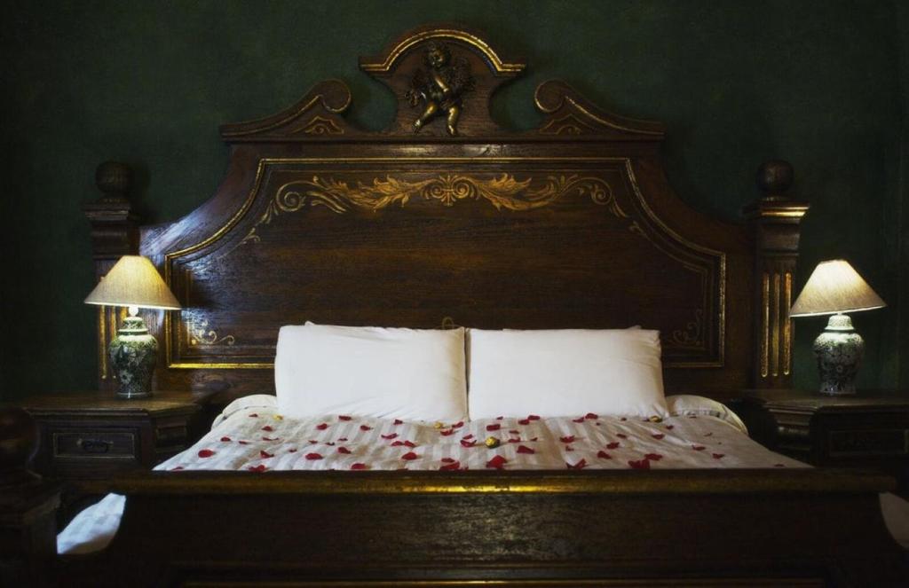 Postel nebo postele na pokoji v ubytování Villa Claus Inn