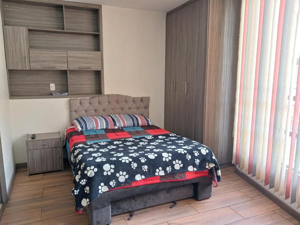 Cama ou camas em um quarto em Apartaestudios amoblados por días Centro de Pasto