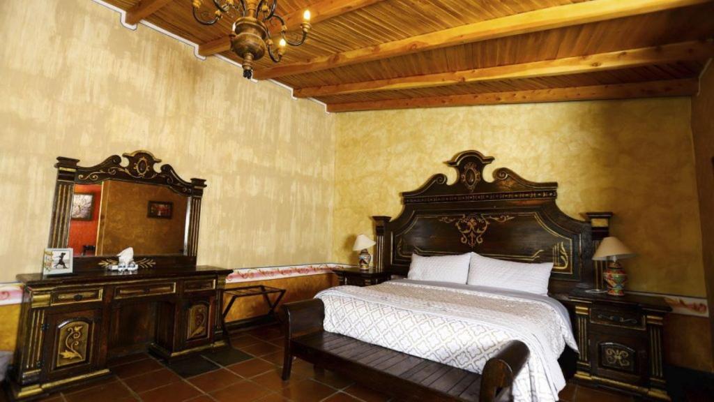 Postel nebo postele na pokoji v ubytování Villa Claus Inn