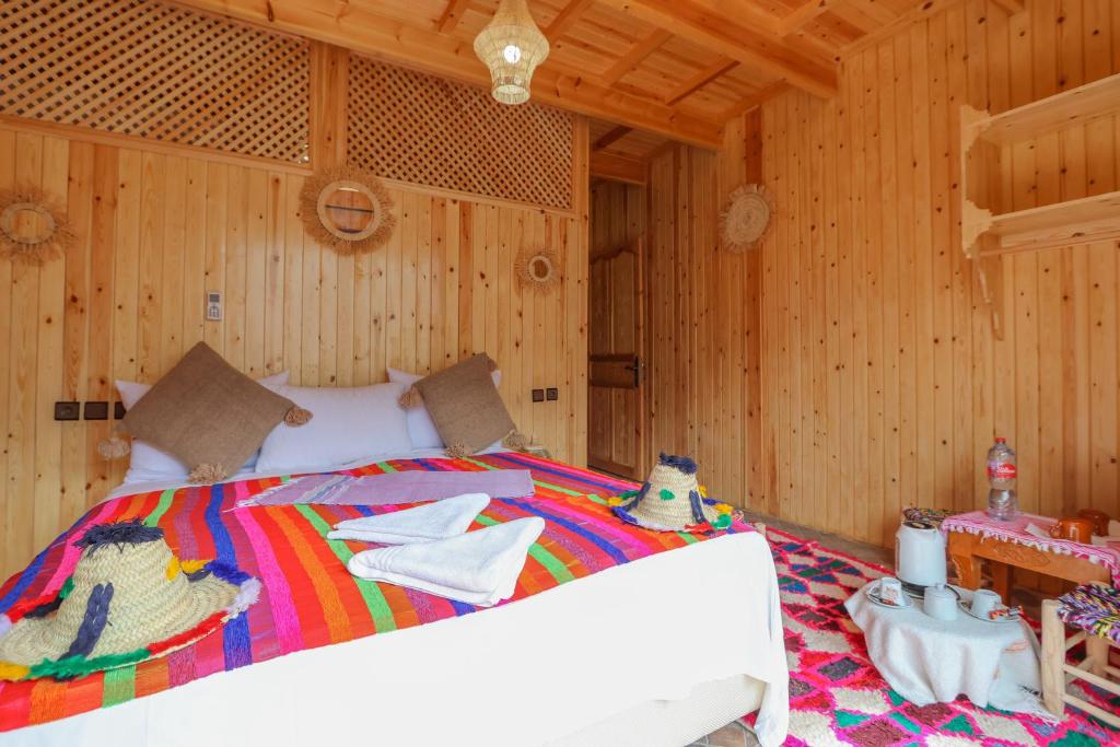 Postel nebo postele na pokoji v ubytování Dar Aymane