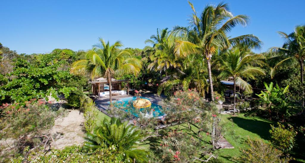 an aerial view of a resort with a swimming pool at Casas da Vila in Trancoso
