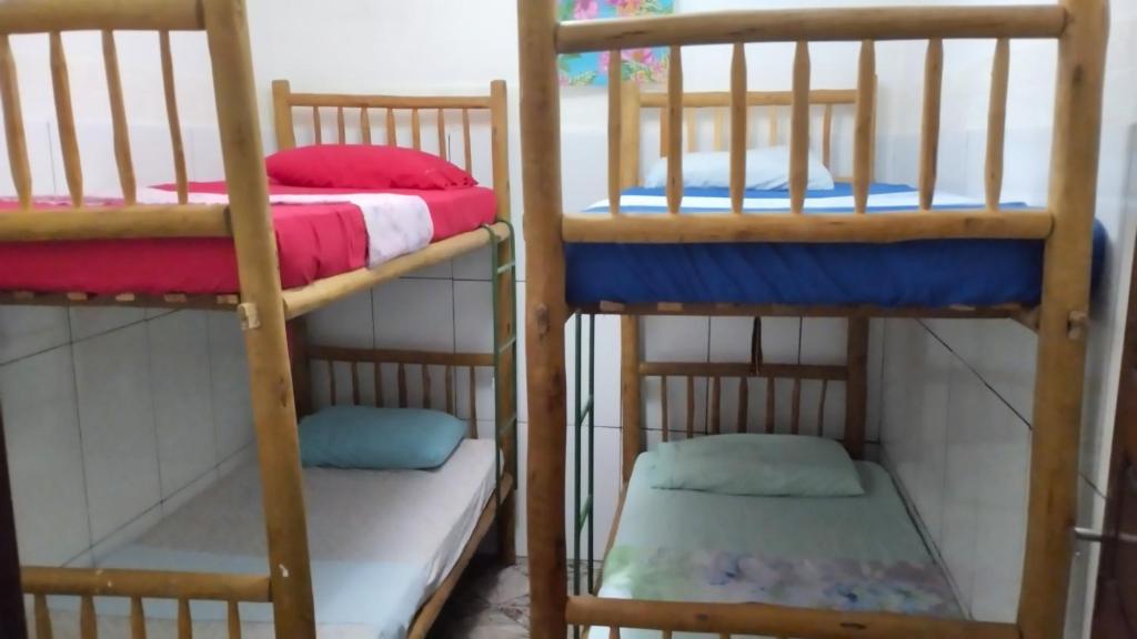 Postel nebo postele na pokoji v ubytování Jurema Hostel