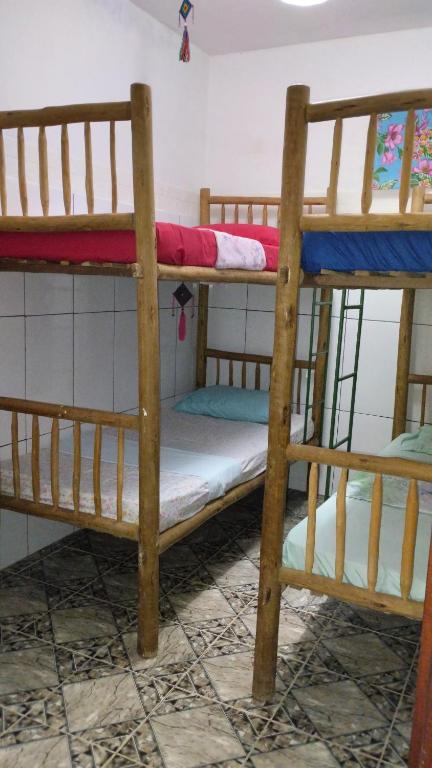 Postel nebo postele na pokoji v ubytování Jurema Hostel