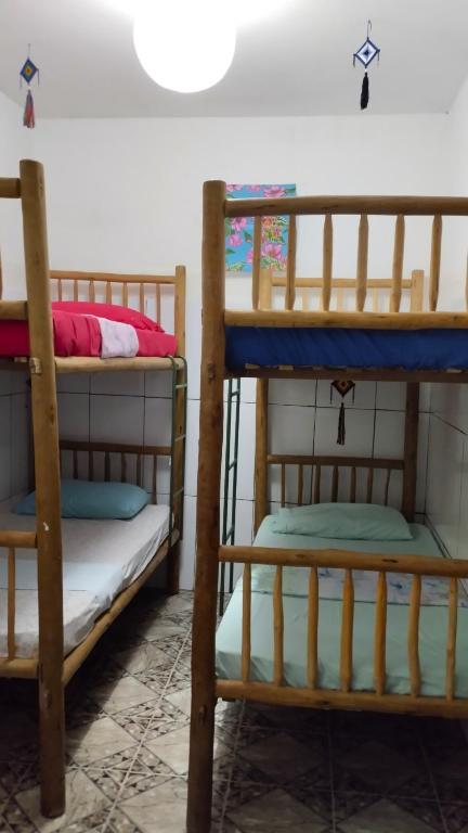Postel nebo postele na pokoji v ubytování Jurema Hostel