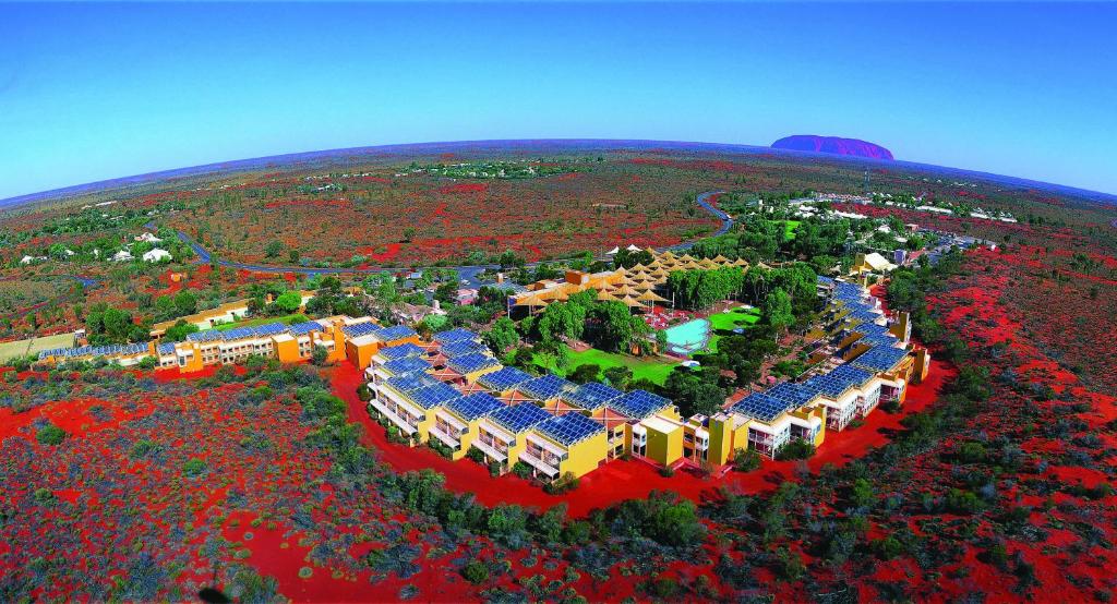 an aerial view of a resort on a hill at Emu Walk Apartments in Ayers Rock