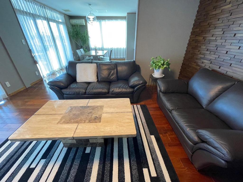 Posezení v ubytování Maria Hotel 宇都宮
