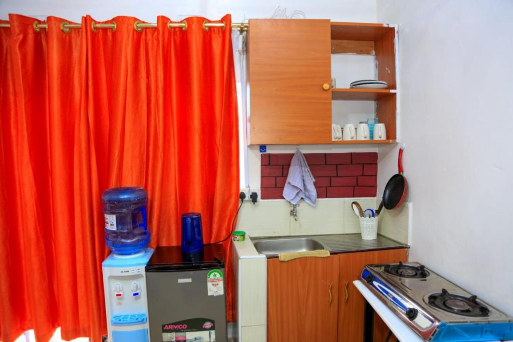 Kuhinja ili čajna kuhinja u objektu Nash2 AirbnB - Studio CBD Nakuru