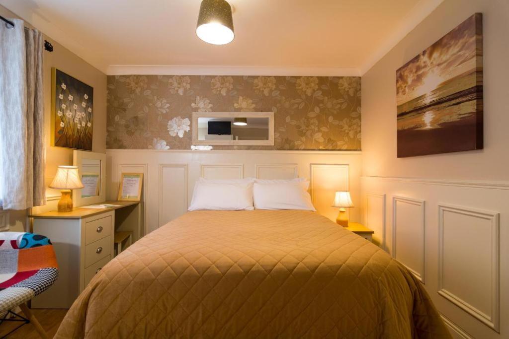Postel nebo postele na pokoji v ubytování Seacrest B&B
