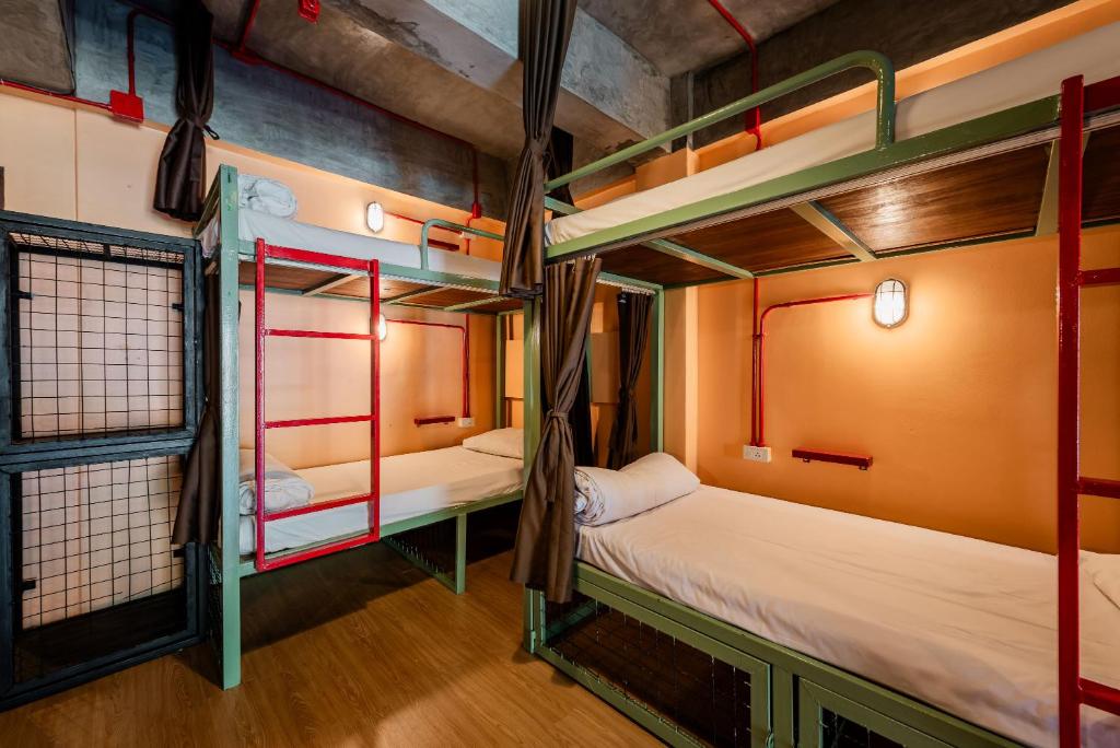Postel nebo postele na pokoji v ubytování Sleeper Hostel