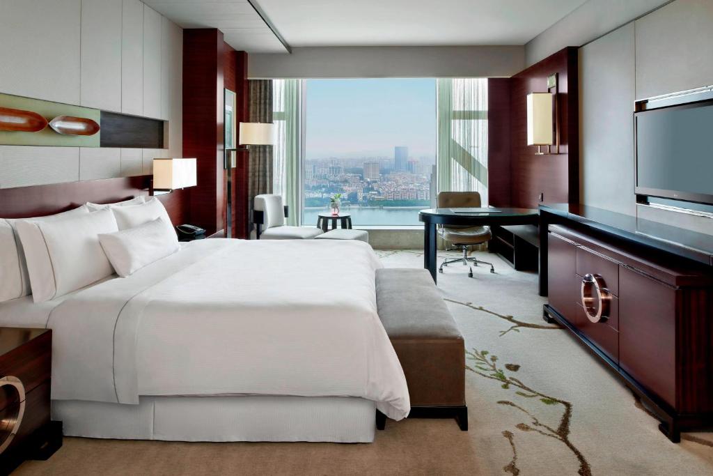 Postel nebo postele na pokoji v ubytování The Westin Pazhou
