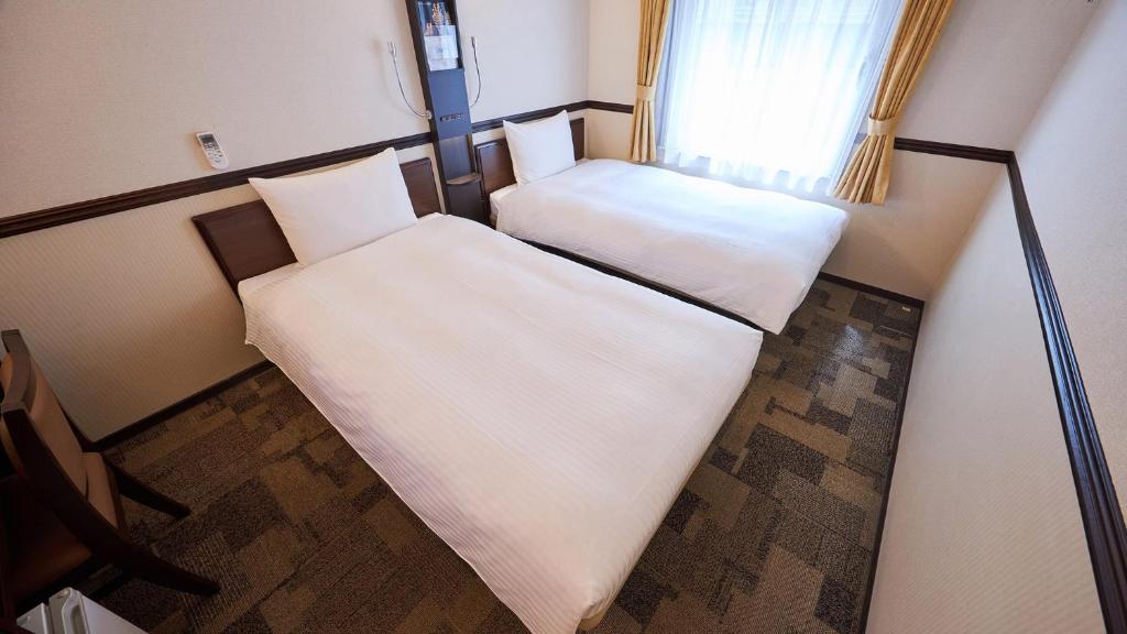 Toyoko Inn Tokyo Fussa Ekimae Higashi guchi - Camera Doppia Con Letti Singoli - Non Fumatori