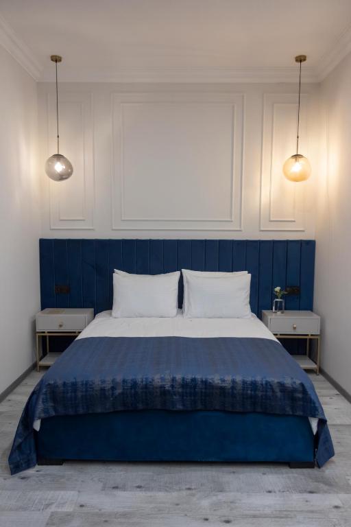 Postel nebo postele na pokoji v ubytování Parvana Guest House