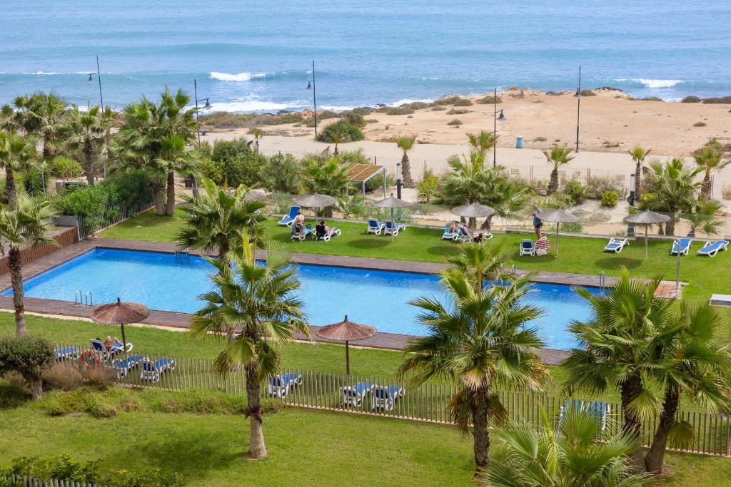 The swimming pool at or close to Fidalsa Paradise Sea Punta Prima