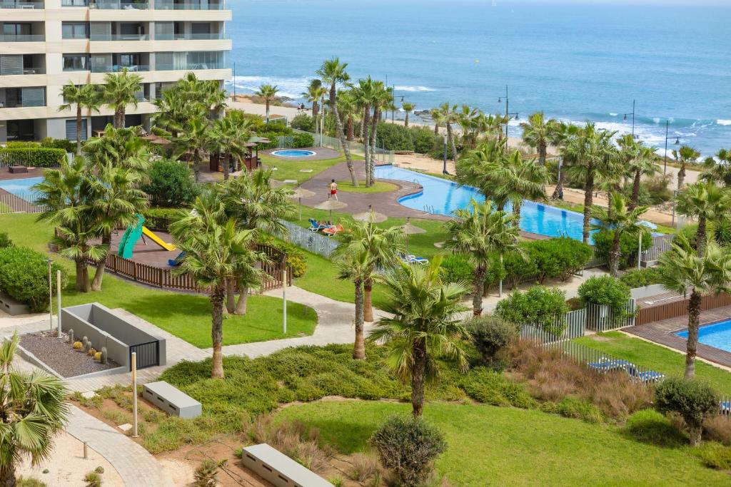 The swimming pool at or close to Fidalsa Paradise Sea Punta Prima