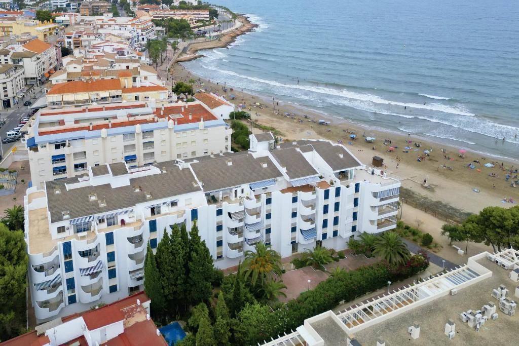 an aerial view of a beach and buildings at Kione Las Margaritas in Alcossebre