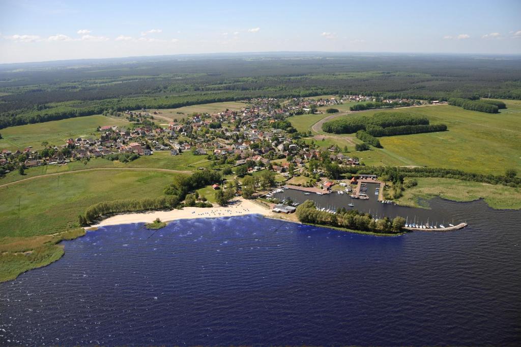 an aerial view of a small island in the water at Apartment am Stettiner Haff in Mönkebude