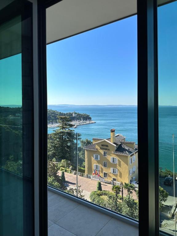 a view of the ocean from a house at Maximilian Suites in Trieste