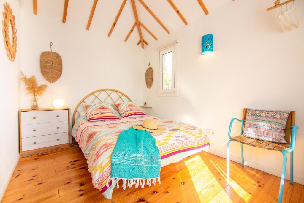 Postel nebo postele na pokoji v ubytování CABAÑA LA PALMERITA en Playa El Palmar