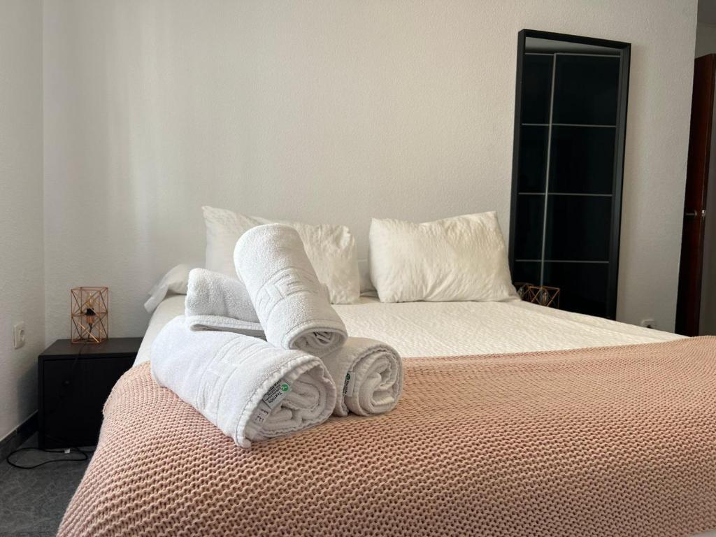 Postel nebo postele na pokoji v ubytování Apartamento Los Califas a 100m de la Catedral
