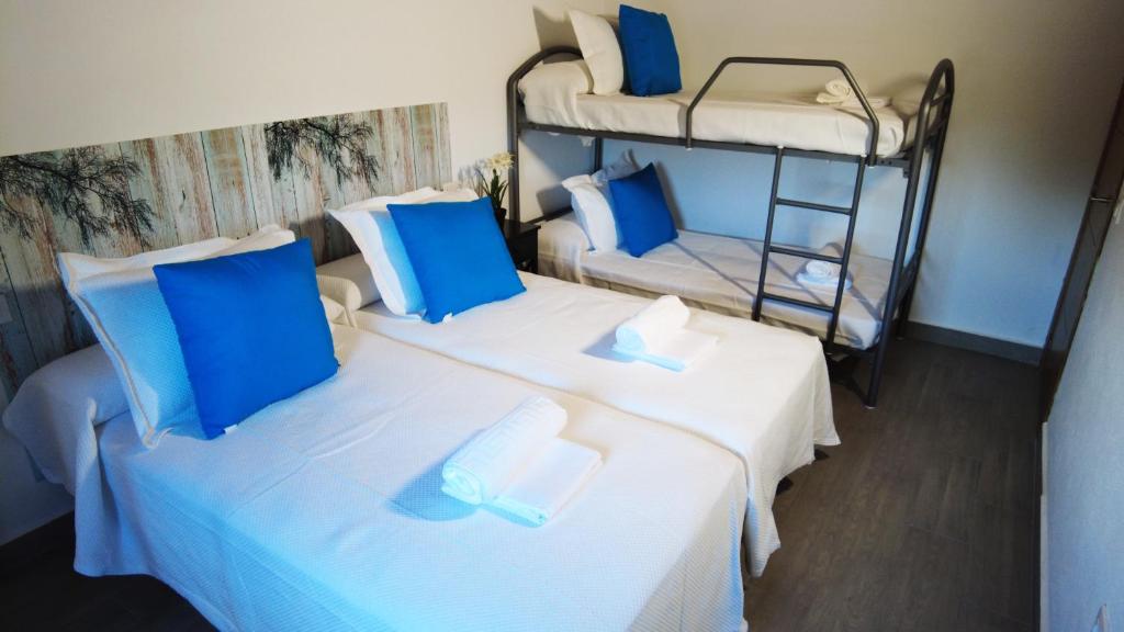 Postel nebo postele na pokoji v ubytování Villa Encanto
