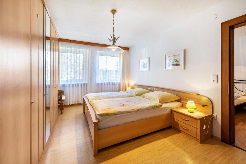 Postel nebo postele na pokoji v ubytování Ferienwohnung im Haus Stöckl