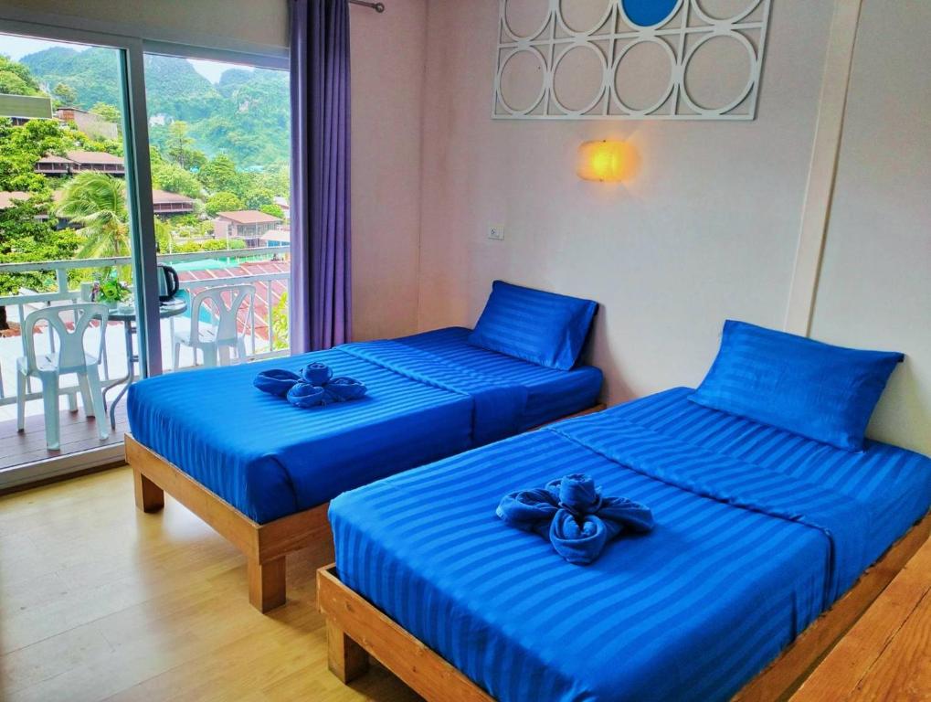 Llit o llits en una habitació de Blue View House Phi Phi
