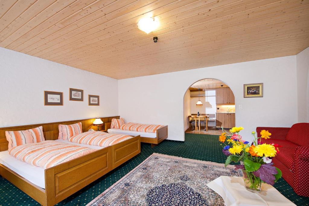 Postel nebo postele na pokoji v ubytování Hotel guter Hirte