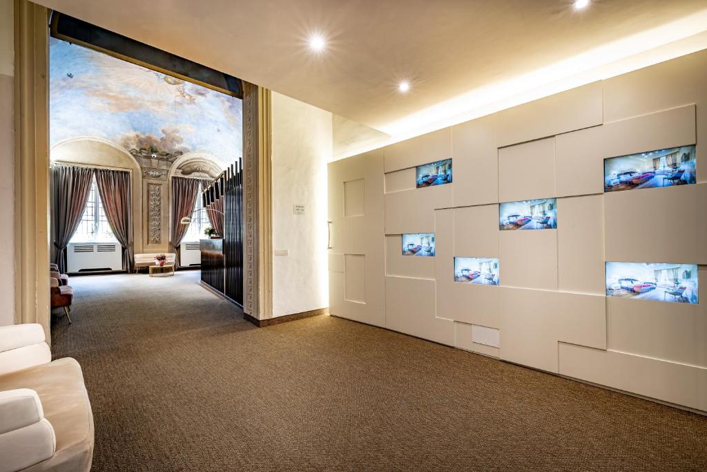 TV a/nebo společenská místnost v ubytování Hotel La Scaletta al Ponte Vecchio