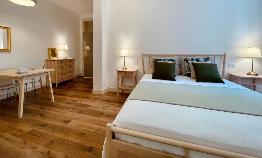 Voodi või voodid majutusasutuse Palazzo Pitagora toas