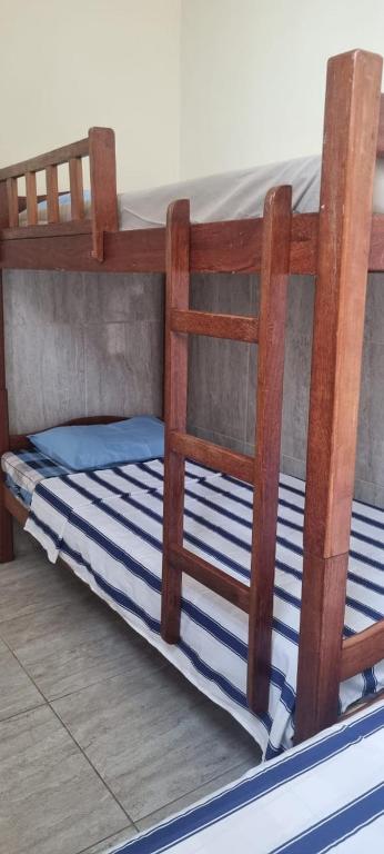 Postel nebo postele na pokoji v ubytování Pousada Pitanga