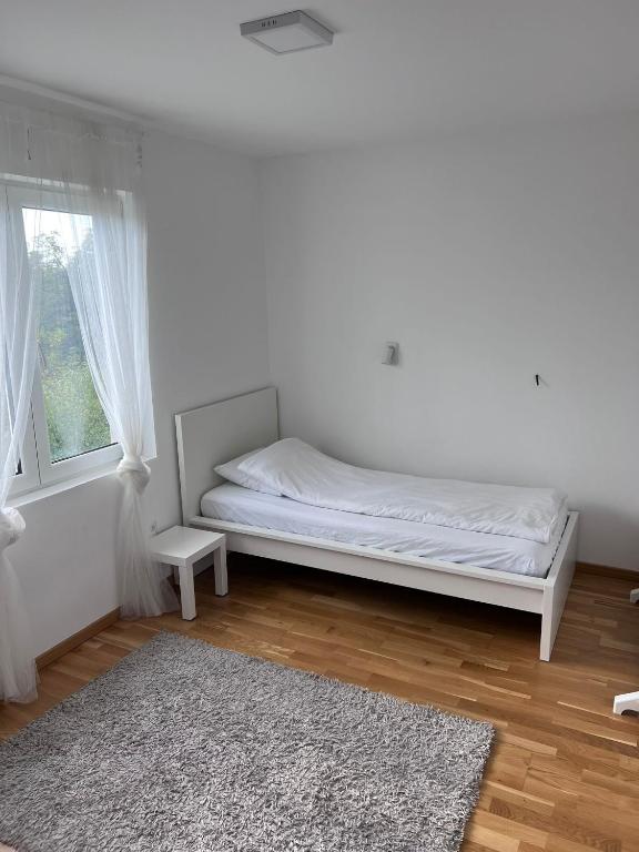 Postel nebo postele na pokoji v ubytování NIK