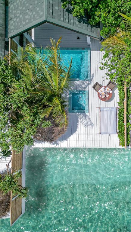 Malahini Kuda Bandos Special Offer Begin your island escape with ease airport pick up and return by shared speedboat at just USD 50 per person stays stay untill end June photo