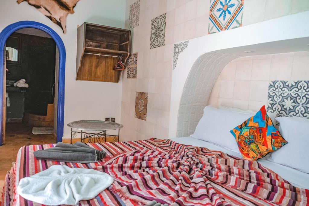 Postel nebo postele na pokoji v ubytování Héritage Lalla Aicha Hotel & Spa