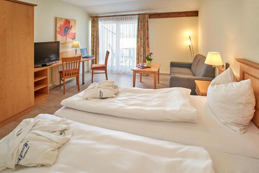 Postel nebo postele na pokoji v ubytování Apparthotel Minerva Diana Octavia