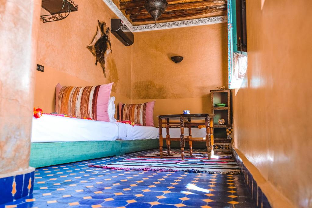 Postel nebo postele na pokoji v ubytování Héritage Lalla Aicha Hotel & Spa