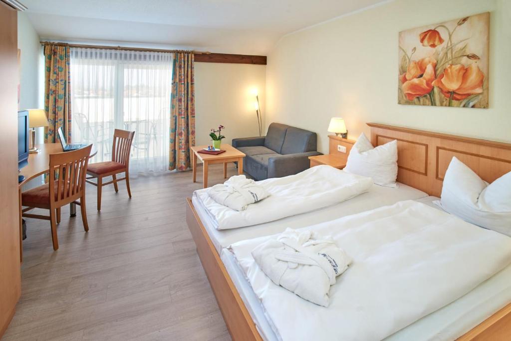 Postel nebo postele na pokoji v ubytování Apparthotel Minerva Diana Octavia