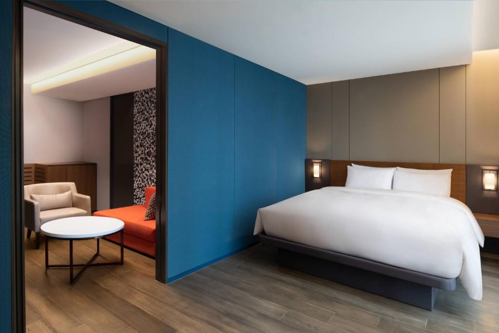 Postel nebo postele na pokoji v ubytování Courtyard by Marriott Suwon