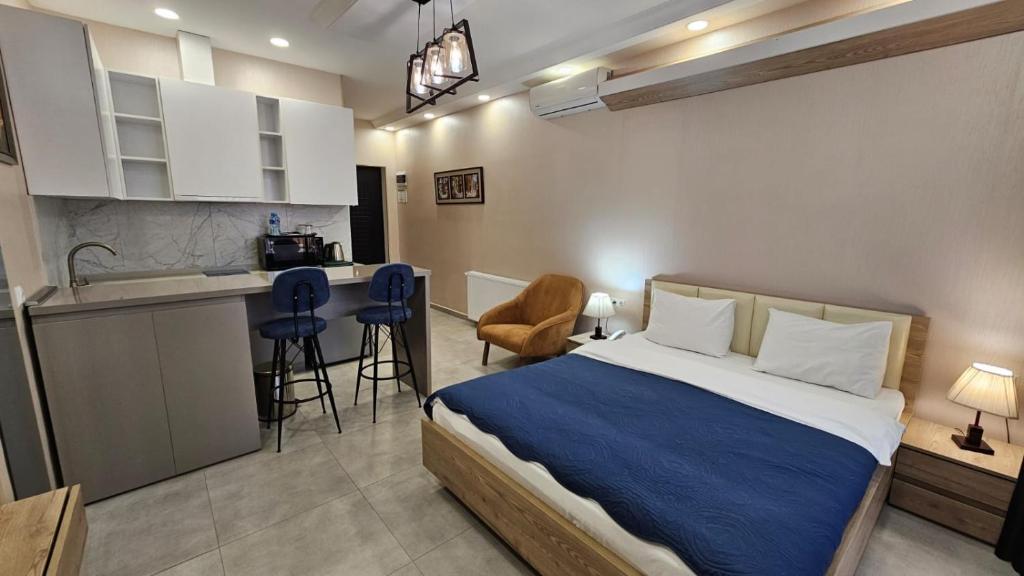 Kuchyň nebo kuchyňský kout v ubytování MD Apart Hotel Tbilisi