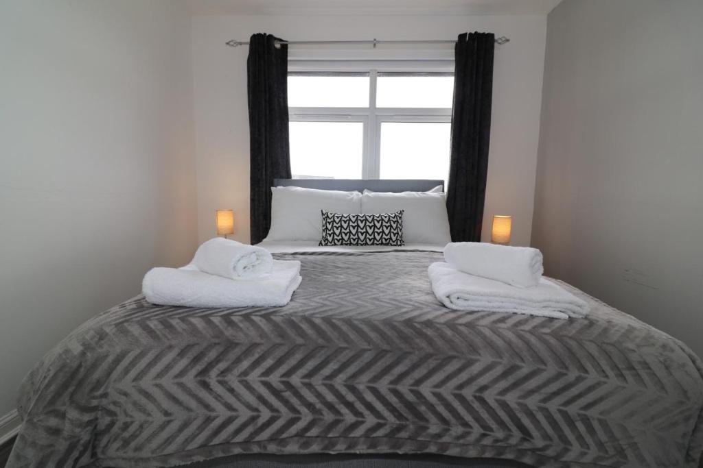 Llit o llits en una habitaci&oacute; de Signature - Culzean House