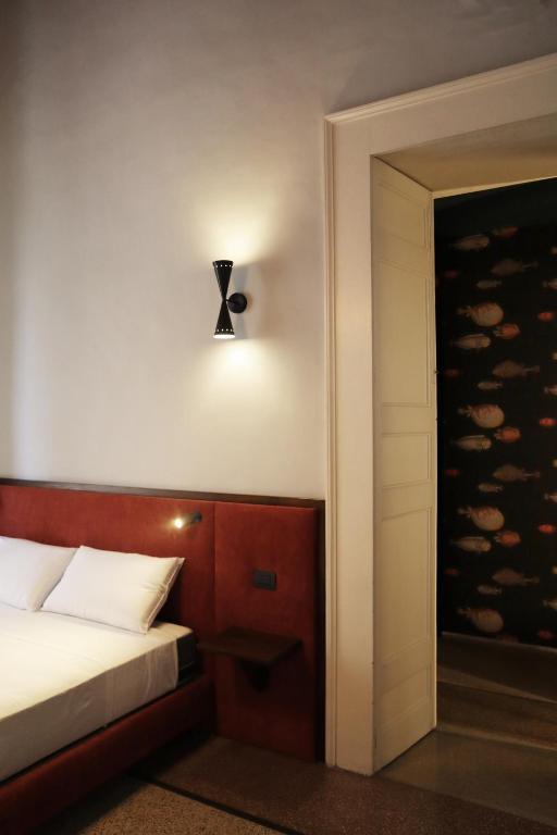 Voodi või voodid majutusasutuse Roiss Haus Suites toas