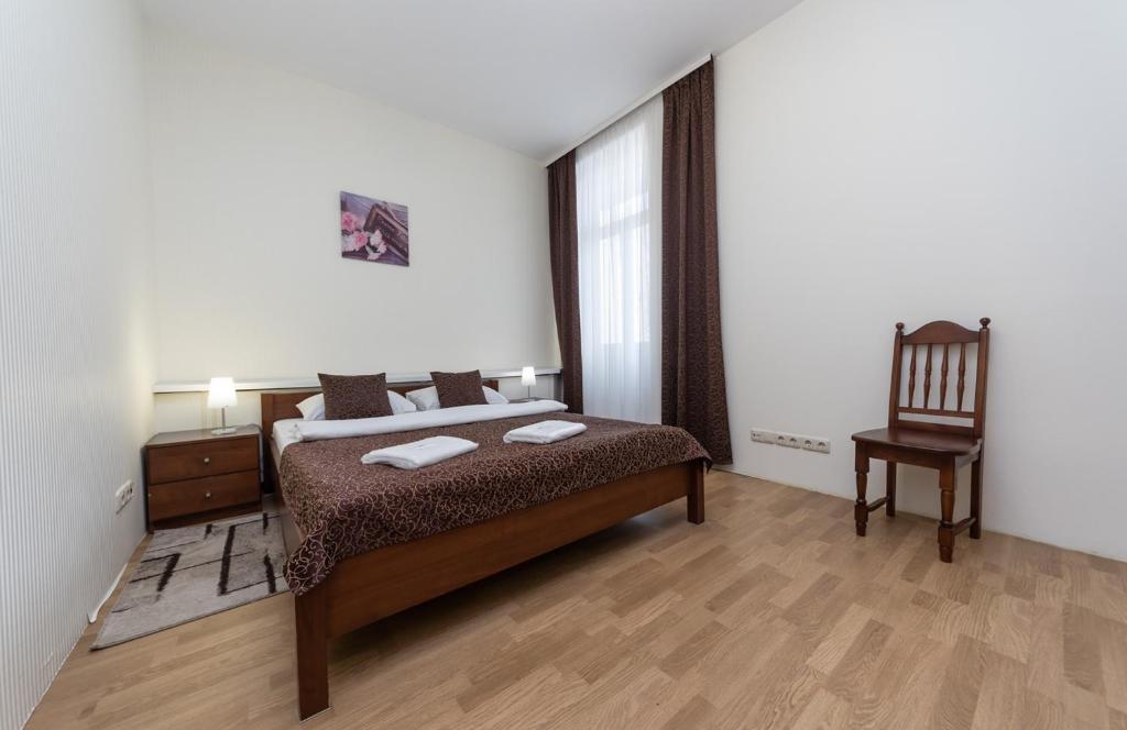 Кровать или кровати в номере Mini-Hotel Guest Residence
