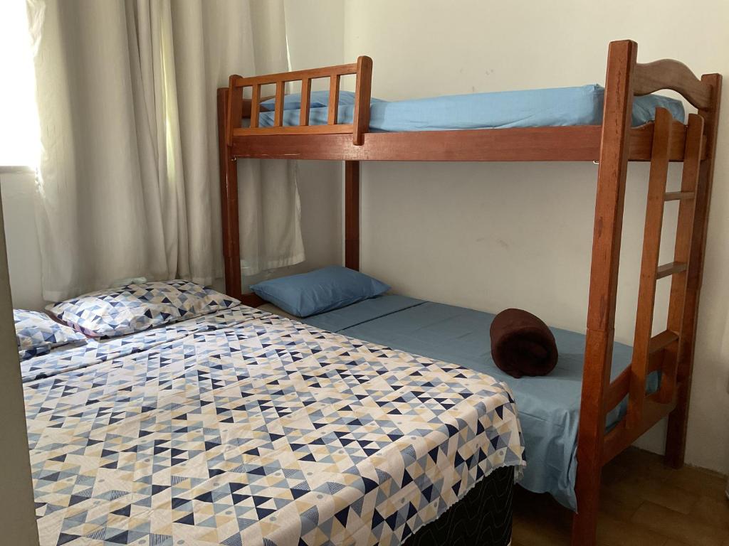 Postel nebo postele na pokoji v ubytování Pousada Pitanga
