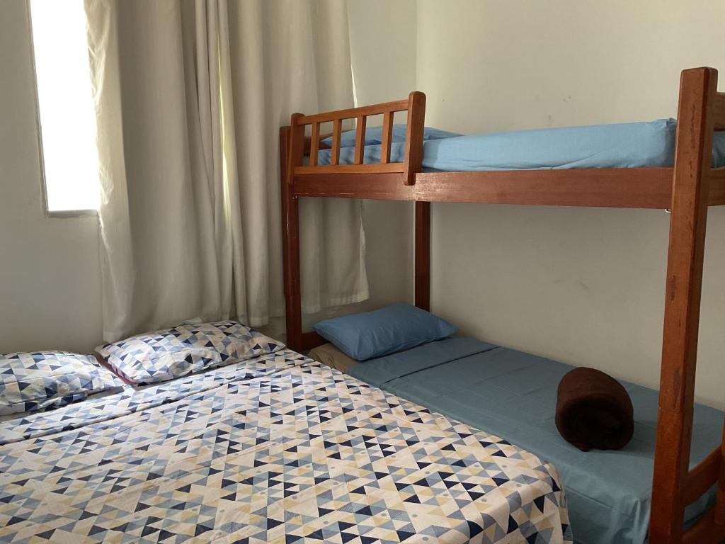Postel nebo postele na pokoji v ubytování Pousada Pitanga