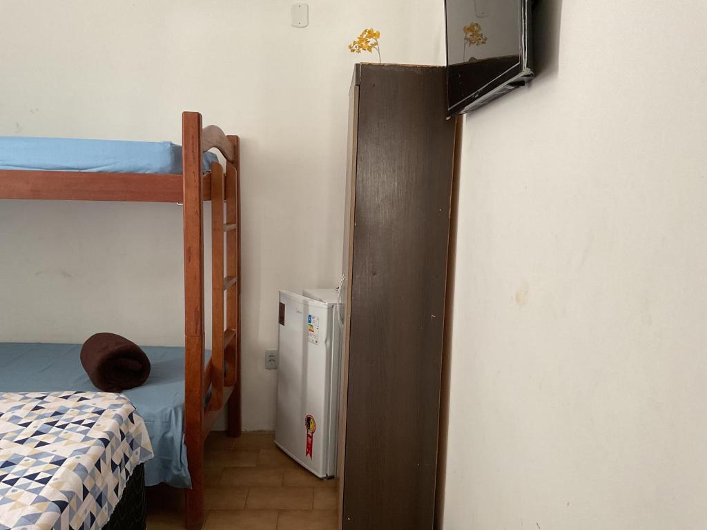 Postel nebo postele na pokoji v ubytování Pousada Pitanga